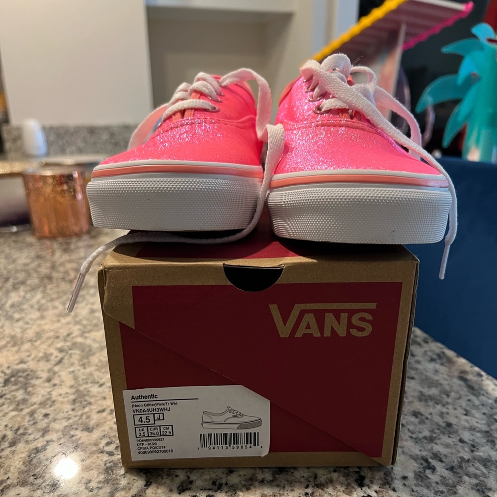 Girls Vans size 4.5 neon glitter pink with white laces.